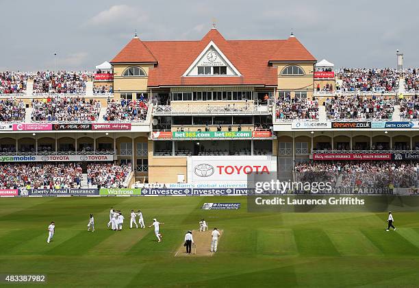 Mark Wood of England celebrates taking the final wicket to win the Ashes that of Nathan Lyon of Australia during day three of the 4th Investec Ashes...