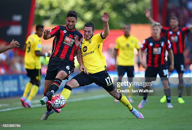 Andrew Surman of Bournemouth and Jordan Veretout of Aston Villa compete for the ball during the Barclays Premier League match between A.F.C....