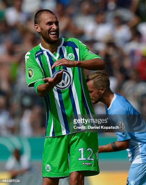 Bas Dost of Wolfsburg celebrates his team's second goal during the DFB Cup First Round match between Stuttgarter Kickers and VfL Wolfsburg at...