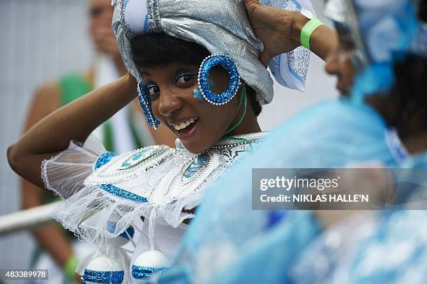 Dancer from the London school of Samba prepares backstage before performing during the Brazil Day party celebrating one year to go until the Rio 2016...