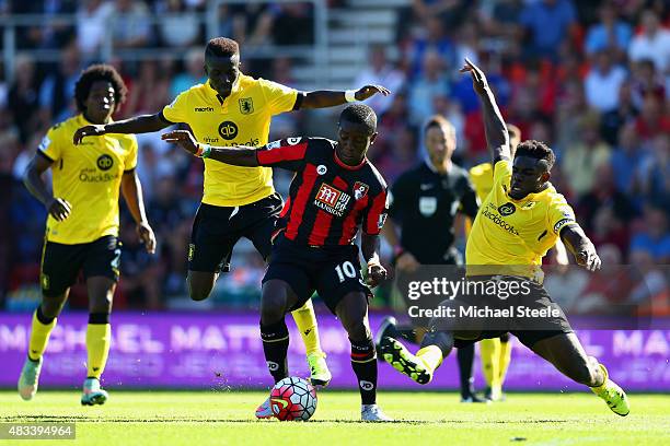 Max Gradel of Bournemouth and Micah Richards of Aston Villa compete for the ball during the Barclays Premier League match between A.F.C. Bournemouth...