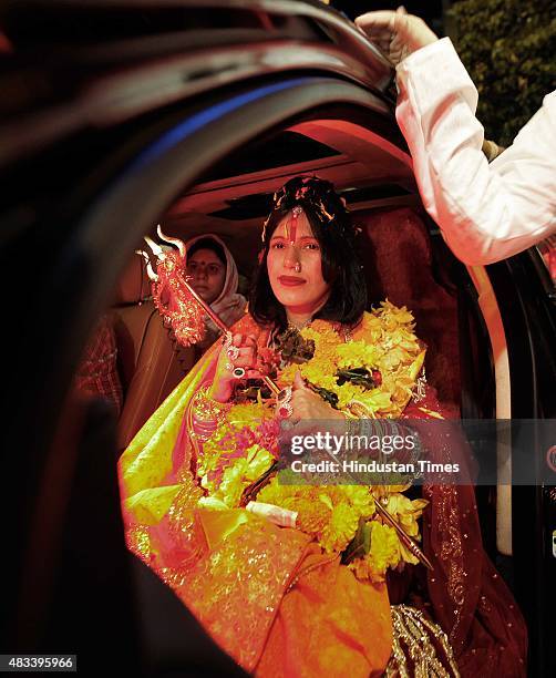 Radhe Maa, self-proclaimed Godwoman, visits Siddhivinayak Temple, Prabhadevi, on August 27, 2012 in Mumbai, India. Radhe Maa has been accused of...