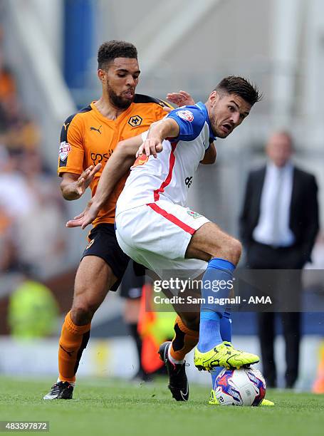 Ben Marshall of Blackburn Rovers and Scott Golbourne of Wolverhampton Wanderers during the Sky Bet Championship match between Blackburn Rovers and...