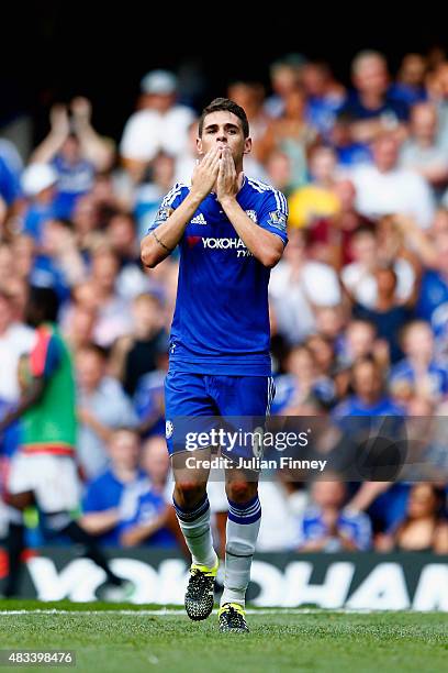 Oscar of Chelsea celebrates scoring his team's first goal uring the Barclays Premier League match between Chelsea and Swansea City at Stamford Bridge...