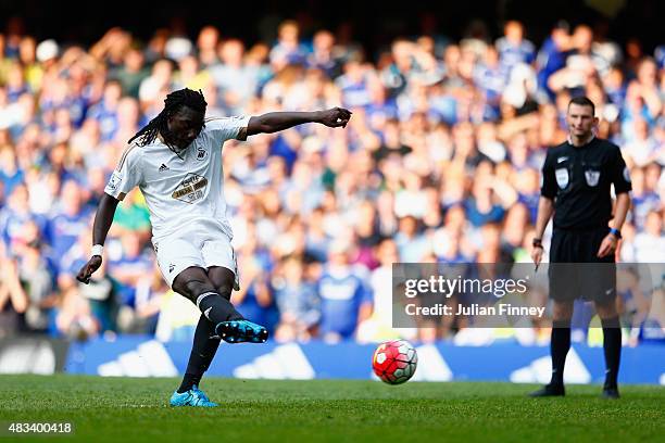 Bafetimbi Gomis of Swansea City scores his team's second goal from the penalty spot during the Barclays Premier League match between Chelsea and...