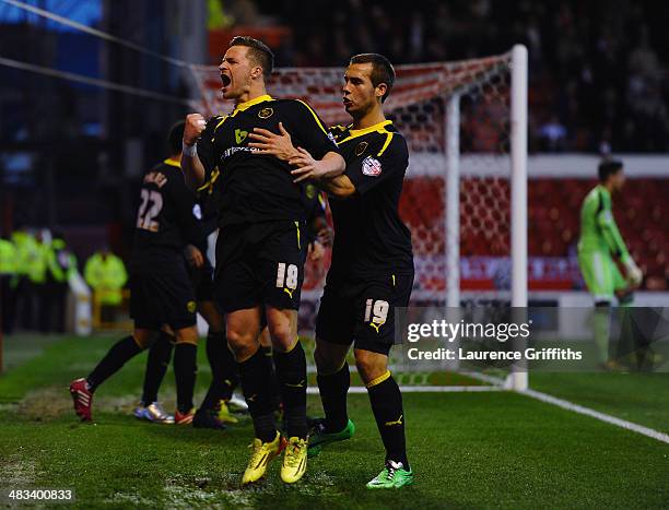 Chris Maguire of Sheffield Wednesday celebrates scoring a first half penalty during the Sky Bet Championship match between Nottingham Forest and...