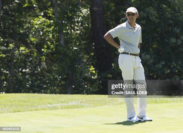 President Barack Obama plays golf at Farm Neck Golf Club in Oak Bluffs on Martha's Vineyard in Massachusetts, August 8, 2015. The Obama family is on...