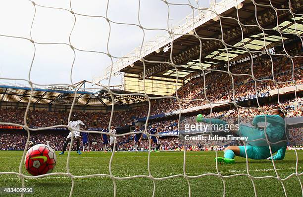 Bafetimbi Gomis of Swansea City scores his team's second goal from the penalty spot past Asmir Begovic of Chelsea during the Barclays Premier League...
