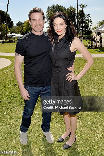 Actors Eddie McClintock and Joanne Kelly attend NBCUniversal's Summer Press Day at Langham Hotel on April 8, 2014 in Pasadena, California.