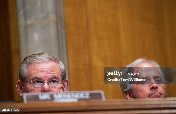 Chairman Bob Menendez, D-N.J., and Sen. Bob Corker, R-Tenn., ranking member, listen to testimony from Secretary of State John Kerry, during a Senate...