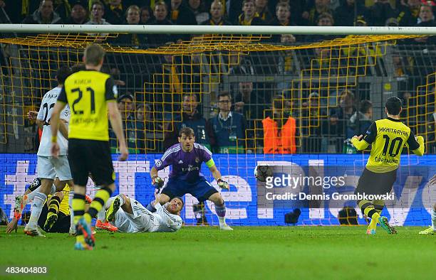 Henrikh Mkhitaryan of Borussia Dortmund misses a chance at goal as goalkeeper Iker Casillas of Real Madrid looks on during the UEFA Champions League...