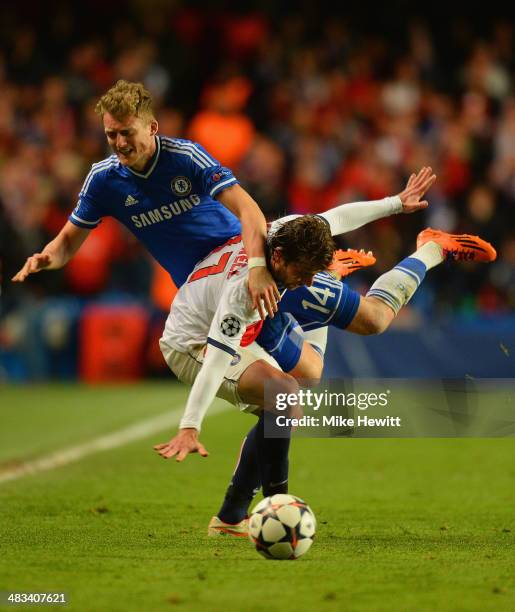 Andre Schurrle of Chelsea is fouled by Maxwell of PSG during the UEFA Champions League Quarter Final second leg match between Chelsea and Paris...