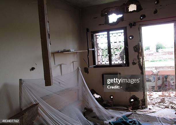 Photo taken on August 8, 2015 shows bullet holes in the walls of a room at the Hotel Byblos in the central Malian town of Sevare, after gunmen...