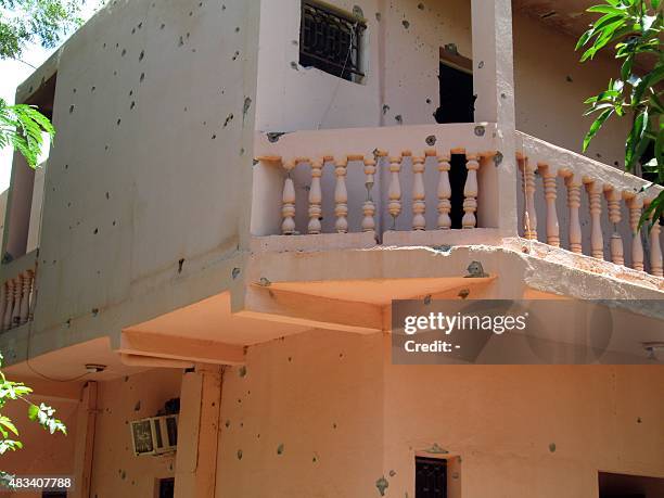 Photo taken on August 8, 2015 shows bullet holes in the walls of the Hotel Byblos in the central Malian town of Sevare, after gunmen stormed the...