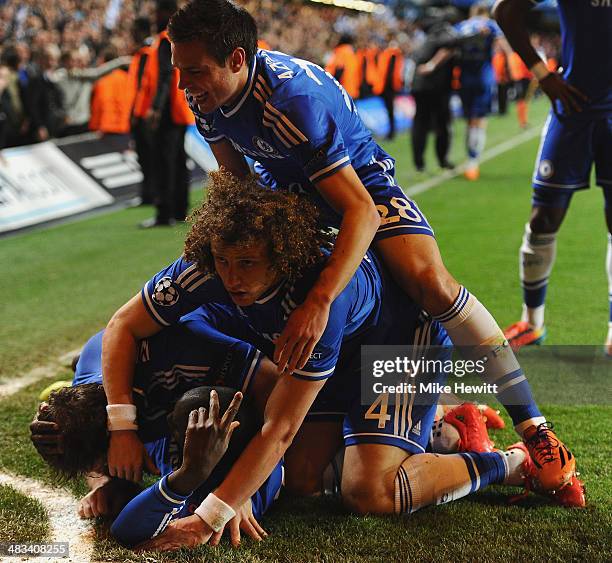 Demba Ba of Chelsea celebrates scoring their second goal with team mates during the UEFA Champions League Quarter Final second leg match between...