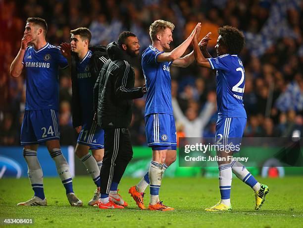 Andre Schurrle of Chelsea celebrates victory with Willian of Chelsea and Ashley Cole of Chelsea during the UEFA Champions League Quarter Final second...