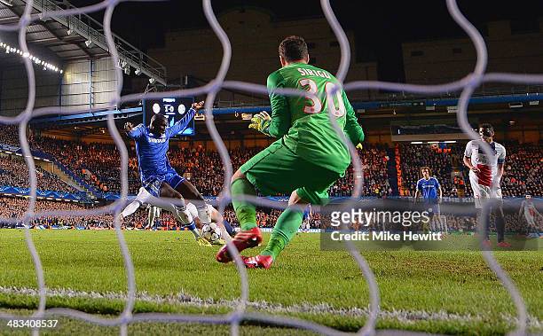 Demba Ba of Chelsea scores their second goal past Salvatore Sirigu of PSG during the UEFA Champions League Quarter Final second leg match between...