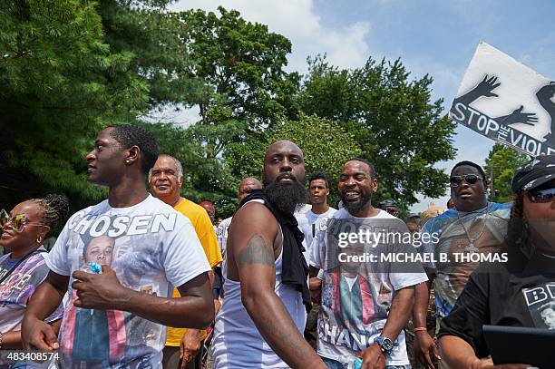 Michael Brown Sr. , father of slain 18 year-old Michael Brown Jr. Walks along with Brown family members during a march of solidarity on August 8,...