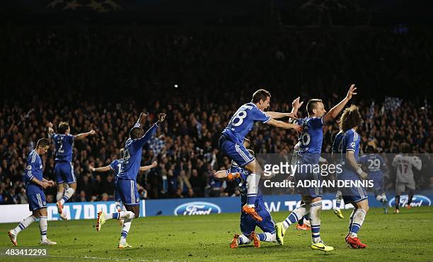 Chelsea players celebrate after the final whistle during the UEFA Champions League quarter final second leg football match between Chelsea and Paris...