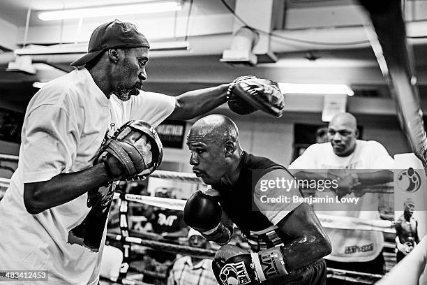 Floyd Mayweather trains at his gym on July 25 in Las Vegas, Nevada, in preparation for his fight with Saul Alvarez, a Mexican boxer known as El...