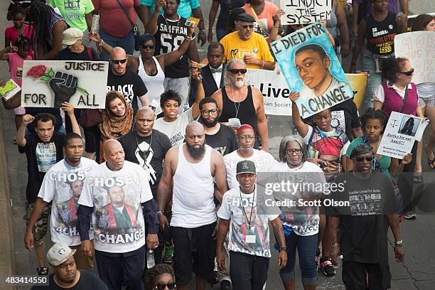 Michael Brown Sr. Leads a march from the location where his son Michael Brown Jr. Was shot and killed to Normandy High School where his son was a...