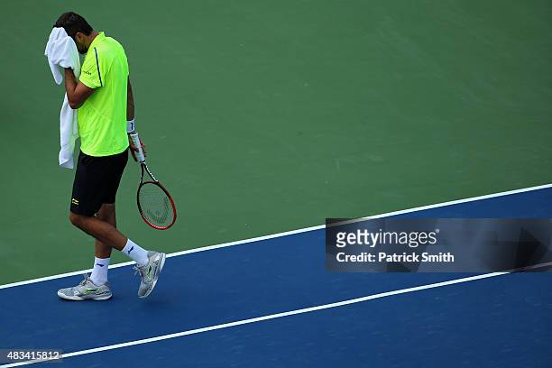 Marin Cilic of Croatia reacts during a match against Kei Nishikori of Japan during the Citi Open at Rock Creek Park Tennis Center on August 8, 2015...