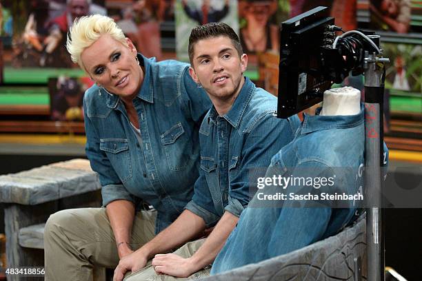 Brigitte Nielsen and Joey Heindle attend the final of the television show 'Ich bin ein Star - lasst mich wieder rein!' on August 8, 2015 in Huerth,...