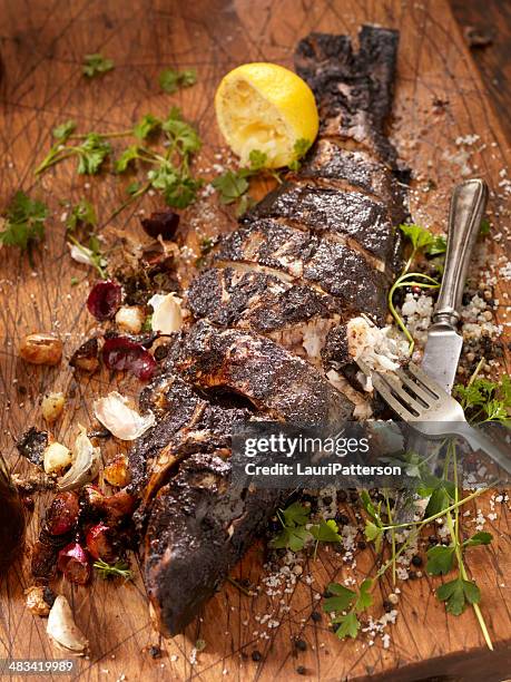 blackened cajun sea bass - sea bass stock pictures, royalty-free photos & images