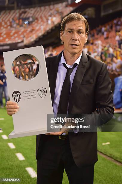 Roma coach Rudi Garcia with the trophy after the pre-season friendly match between Valencia CF and AS Roma at Estadio Mestalla on August 8, 2015 in...