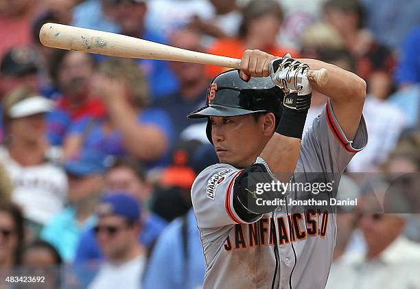 Nori Aoki of the San Francisco Giants bats against the Chicago Cubs at Wrigley Field on August 8, 2015 in Chicago, Illinois.