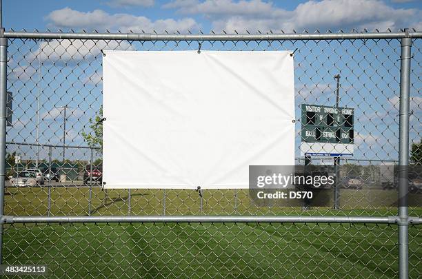 blank banner on a baseball fence - baseball scoreboard stock pictures, royalty-free photos & images