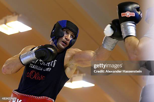 Wladimir Klitschko of Ukraine exchange punches during a training session at Hotel Stanglwirt on April 8, 2014 in Going, Austria. Wladimir Klitschko...