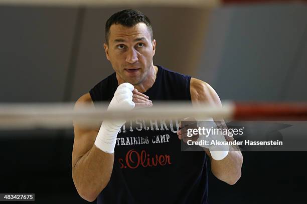 Wladimir Klitschko of Ukraine punches during a training session at Hotel Stanglwirt on April 8, 2014 in Going, Austria. Wladimir Klitschko will...