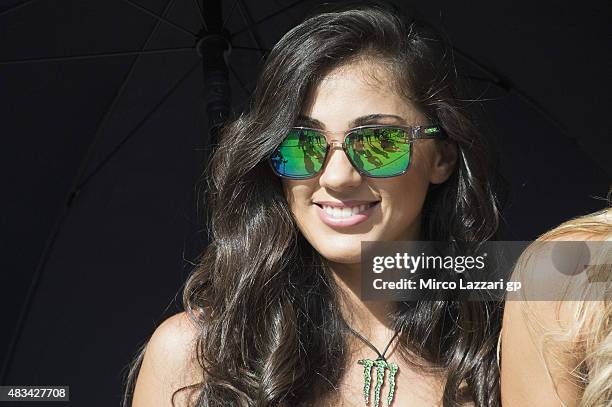 The grid girl smiles in paddock during the MotoGp Red Bull U.S. Indianapolis Grand Prix - Qualifying at Indianapolis Motor Speedway on August 8, 2015...