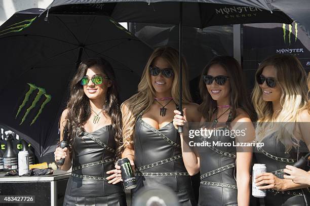 The grid girls pose in paddock during the MotoGp Red Bull U.S. Indianapolis Grand Prix - Qualifying at Indianapolis Motor Speedway on August 8, 2015...