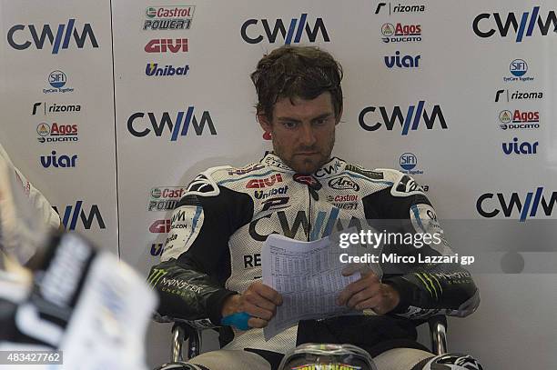 Cal Crutchlow of Great Britain and CWM LCR Honda looks on in box during the MotoGp Red Bull U.S. Indianapolis Grand Prix - Qualifying at Indianapolis...