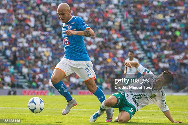 Fabio Santos of Cruz Azul fights for the ball with Fernando Navarro of Leon during a 3rd round match between Cruz Azul and Leon as part of the...