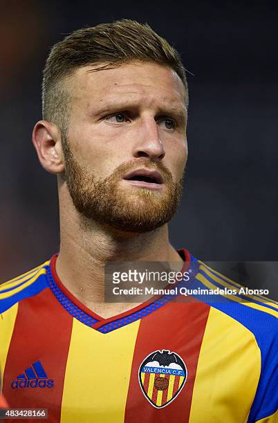 Shkodran Mustafi of Valencia looks on during the pre-season friendly match between Valencia CF and AS Roma at Estadio Mestalla on August 8, 2015 in...