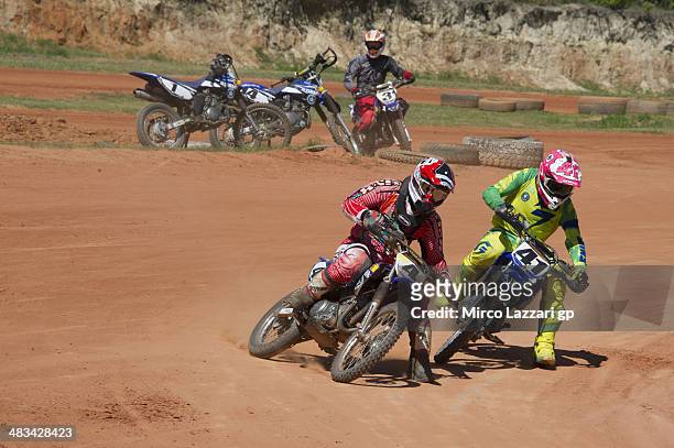 Randy Krummenacher of Switzerland and Iodaracing Project and Aleix Espargaro of Spain and NGM Mobile Forward Racing round the bend during the...