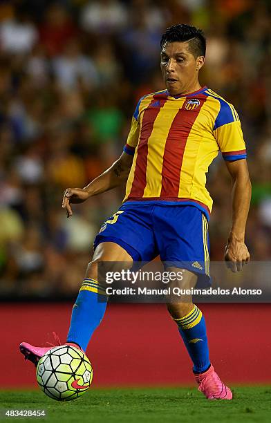 Enzo Perez of Valencia controls the ball during the pre-season friendly match between Valencia CF and AS Roma at Estadio Mestalla on August 8, 2015...