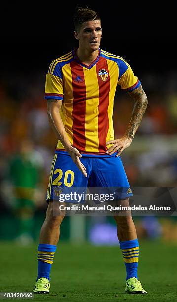 Rodrigo De Paul of Valencia reacts during the pre-season friendly match between Valencia CF and AS Roma at Estadio Mestalla on August 8, 2015 in...