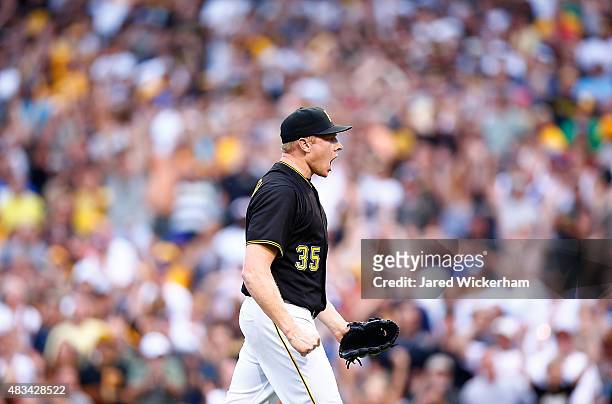 Mark Melancon of the Pittsburgh Pirates celebrates in the ninth inning following the 6-5 win against the Los Angles Dodgers during the game at PNC...