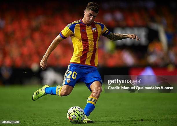 Rodrigo De Paul of Valencia in action during the pre-season friendly match between Valencia CF and AS Roma at Estadio Mestalla on August 8, 2015 in...