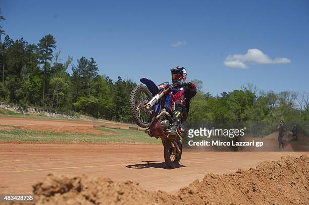 Colin Edwards of USA and NGM Mobile Forward Racing lifts the front wheel during the "Meeting with friends and Colin Edwards of USA" in Texas Tornado...