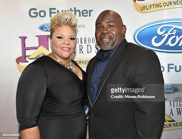 Tamela J. Mann and David Mann attend the 2015 Ford Neighborhood Awards Hosted By Steve Harvey at Phillips Arena on August 8, 2015 in Atlanta, Georgia.