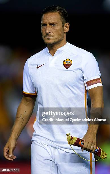 Francesco Totti of Roma looks on prior to the pre-season friendly match between Valencia CF and AS Roma at Estadio Mestalla on August 8, 2015 in...