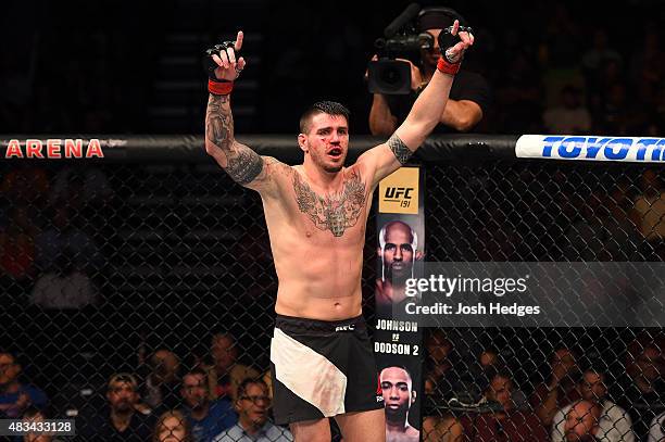 Chris Camozzi celebrates after defeating Tom Watson of England in their middleweight bout during the UFC Fight Night event at Bridgestone Arena on...