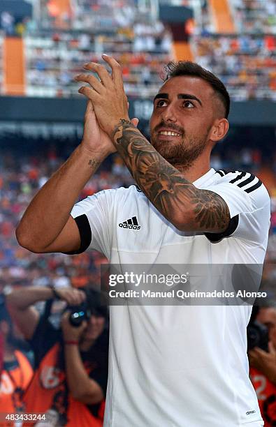 Paco Alcacer of Valencia waves during the team official presentation ahead the pre-season friendly match between Valencia CF and AS Roma at Estadio...