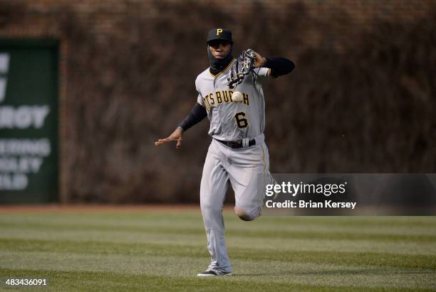 Left fielder Starling Marte of the Pittsburgh Pirates drops a fly ball off the bat of Nate Schierholtz of the Chicago Cubs during the first inning at...