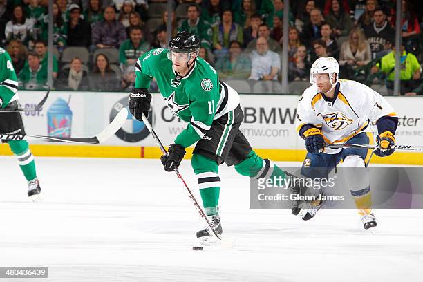 Dustin Jeffrey of the Dallas Stars handles the puck against Matt Cullen of the Nashville Predators at the American Airlines Center on April 8, 2014...